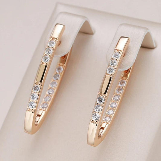 Boucles d'oreilles élégantes en zircon cubique doré