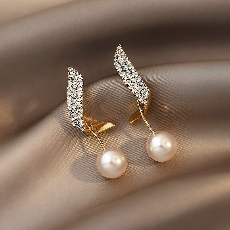 Boucles d'oreilles en or avec des perles