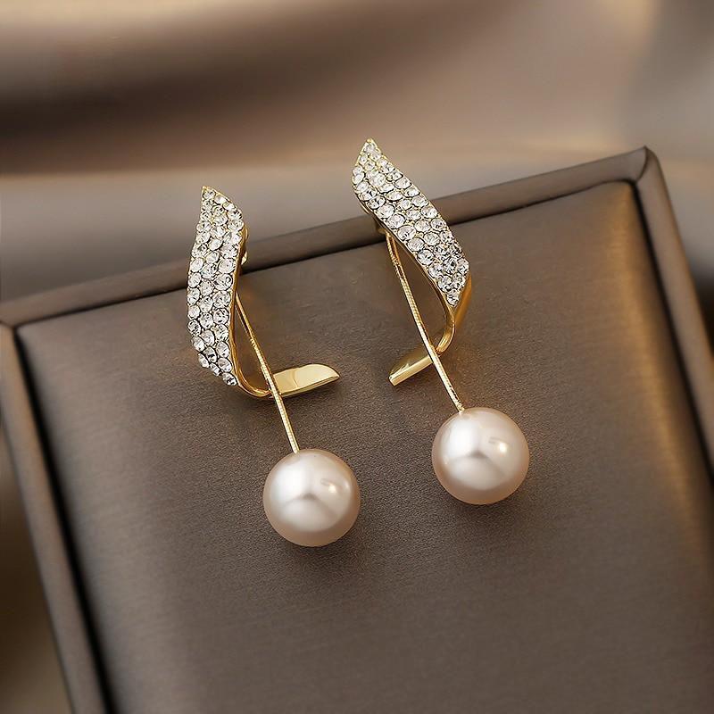 Boucles d'oreilles en or avec des perles