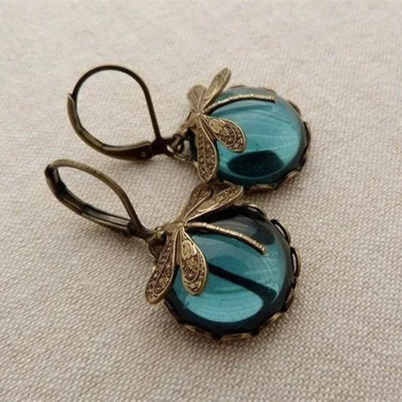 Boucles d'oreilles sphériques à motif libellule en or antique