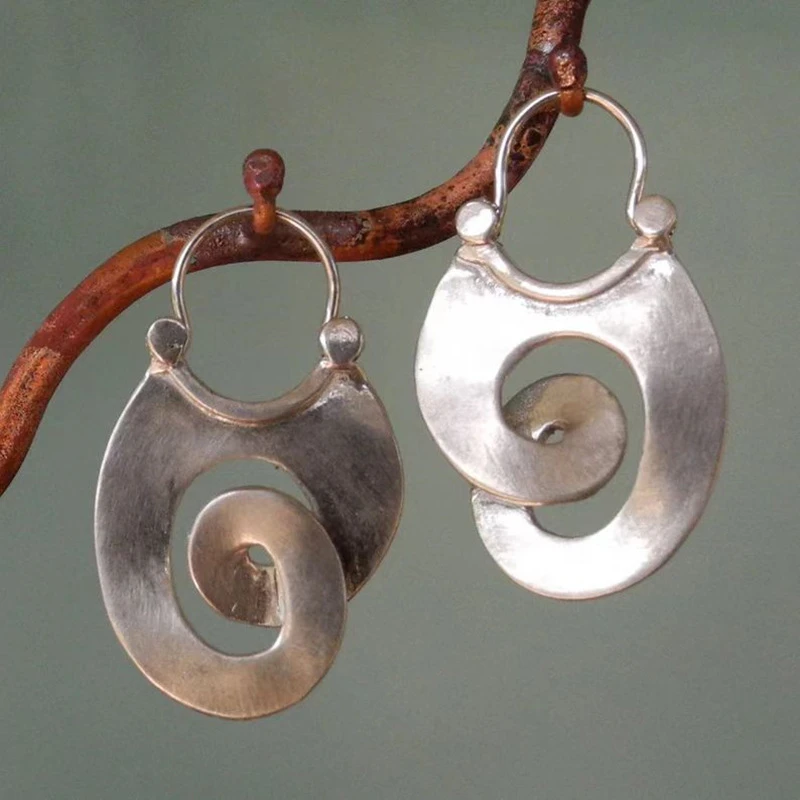 Boucles d'oreilles en argent vintage de forme irrégulière